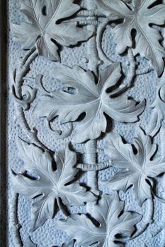 Beautiful carved stone texture on a wall