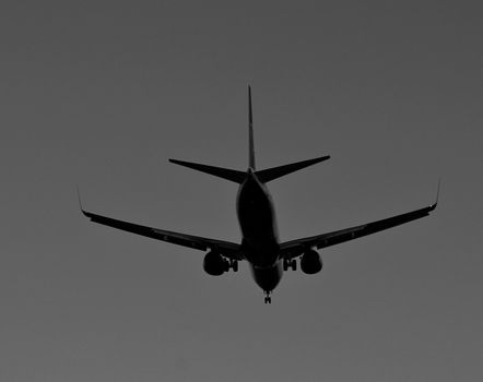 Plane furrowing the sky