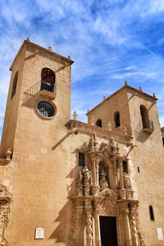 Beautiful Valencian Gothic style Santa Maria Church facade under clear sky in Alicante