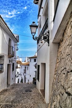 Narrow streets and beautiful white facades in Altea, Alicante, Spain