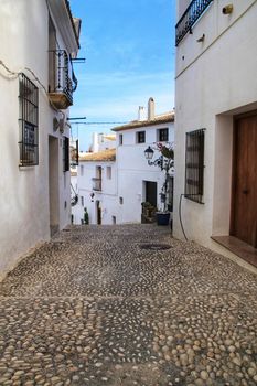 Narrow streets and beautiful white facades in Altea, Alicante, Spain