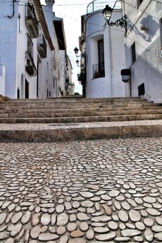 Narrow streets and beautiful white facades in Altea, Alicante, Spain