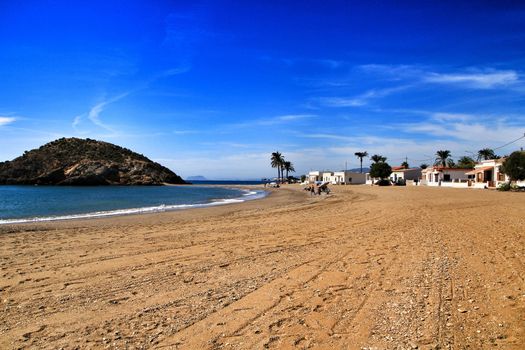 Beautiful Bahia beach in Mazarron, Murcia, Spain. Island in the background.