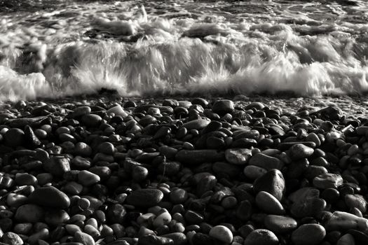 Rock textures and waves on the shore in Cartagena, Murcia, Spain