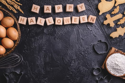 Design concept of top view layout of making Halloween cookies, preparing party, overhead, blank copy space.