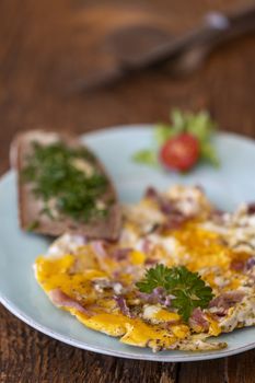 scrambled eggs on a blue plate