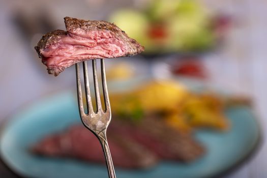 slice of steak on a fork