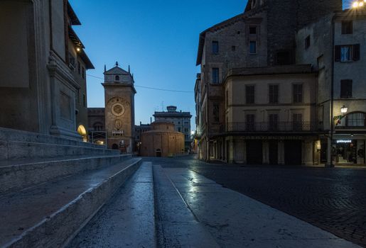 View of the Rotonda di San Lorenzo and the Astronomical Clock in Piazza delle Erbe from the staircase of the Basilica of Sant'Andrea in Mantua