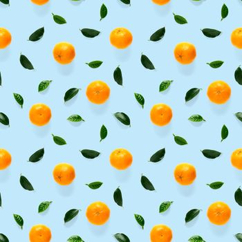 Mandarin seamless pattern, tangerine, clementine isolated on blue background with green leaves. Collection of fine Mandarine seamless patterns.