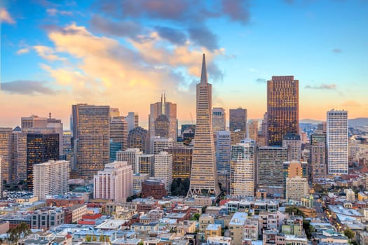 Beautiful view of  business center in downtown San Francisco at sunset.