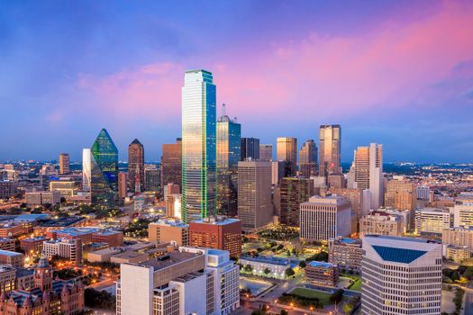 Dallas, Texas cityscape with blue sky at sunset, Texas