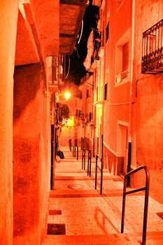 Narrow streets at night in Jijona village in Alicante province, Spain.