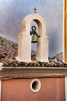 Old bell in antique hermitage in Xixona village in Alicante province, Spain