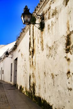 Narrow streets and majestic facades in Cordoba city, Spain.