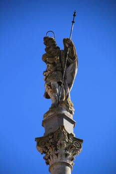 Stone angel statue in a square in Cordoba, Spain