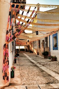 Streets of Tabarca Island in Alicante adorned by the festivity of the Virgen del Carmen