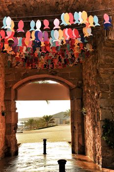 Streets of Tabarca Island in Alicante adorned by the festivity of the Virgen del Carmen