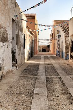 Streets of Tabarca Island in Alicante adorned by the festivity of the Virgen del Carmen