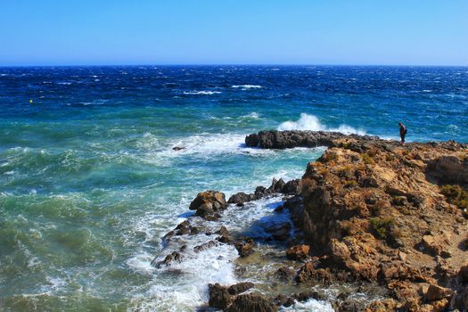 Beaches and cliffs of Tabarca Island in summer in Alicante, Spain