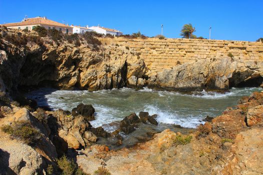 Beaches and cliffs of Tabarca Island in summer in Alicante, Spain