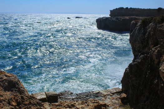 Beaches and cliffs of Tabarca Island in summer in Alicante, Spain
