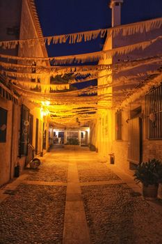 Streets of Tabarca Island in Alicante adorned by the festivity of the Virgen del Carmen