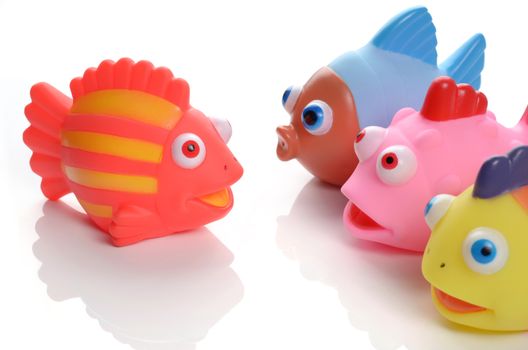 colorful rubber fish bath toy set on white background