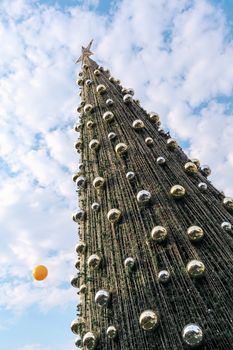 outdoor christmas tree at daytime with beautiful blue sky