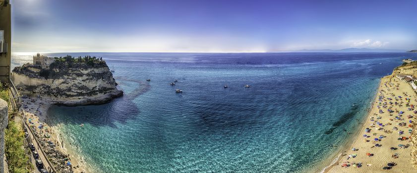 Panoramic view over the main beach in Tropea, a seaside resort located on the Gulf of Saint Euphemia, part of the Tyrrhenian Sea, Calabria, Italy