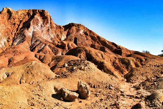 Sediments, rock formations and mineral streaks in an old abandoned quarry in Mazarron, Murcia, Spain