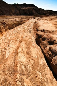 Sediments, rock formations and mineral streaks in an old abandoned quarry in Mazarron, Murcia, Spain