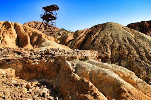 Sediments, rock formations and mineral streaks in an old abandoned quarry in Mazarron, Murcia, Spain