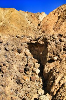 Sediments, rock formations and mineral streaks in an old abandoned quarry in Mazarron, Murcia, Spain