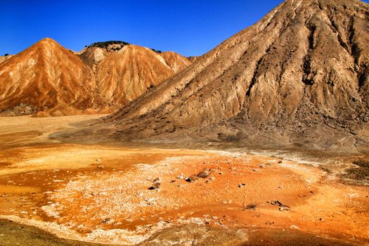 Sediments, rock formations and mineral streaks in an old abandoned quarry in Mazarron, Murcia, Spain