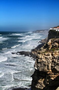 Beautiful brave sea and cliffs of the coast of Azenhas do Mar in Portugal in Spring