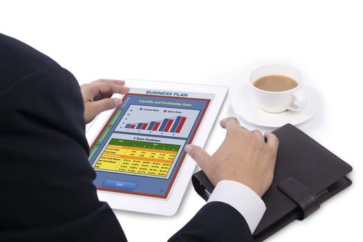 Investors considering business plan that showing on digital tablet.