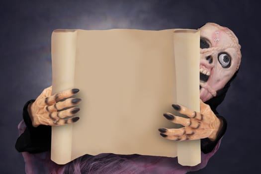 Ghost holding paper poster in hands with dark night background.