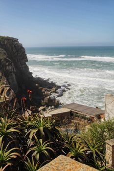 Beautiful brave sea and cliffs of the coast of Azenhas do Mar in Portugal in Spring