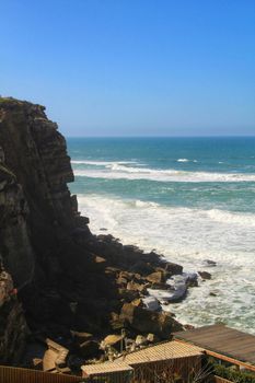 Beautiful brave sea and cliffs of the coast of Azenhas do Mar in Portugal in Spring