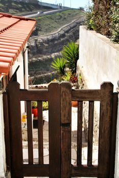 Beautiful narrow streets, white houses and roofs of Azenhas do Mar village in Lisbon, Portugal