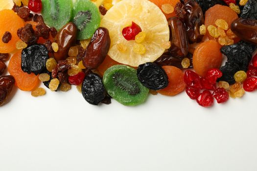 Dried fruits on white background, top view and space for text