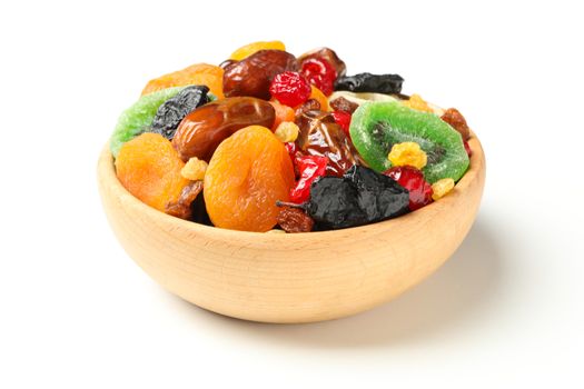 Bowl with dried fruits isolated on white background