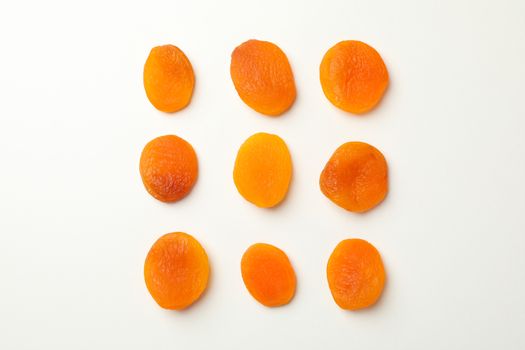 Flat lay with dried apricot on white background