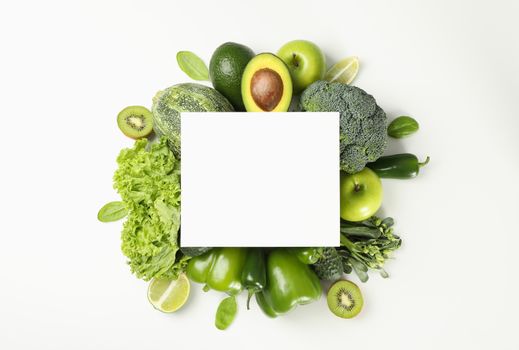 Fresh green vegetables and space for text on white background