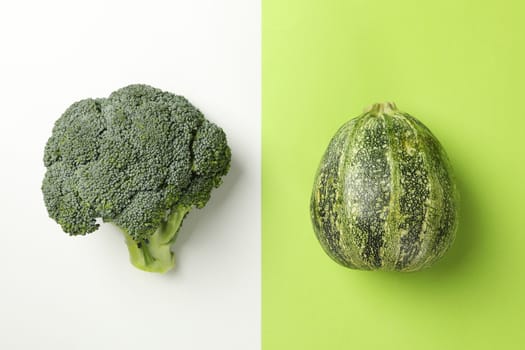 Zucchini and broccoli on two tone background
