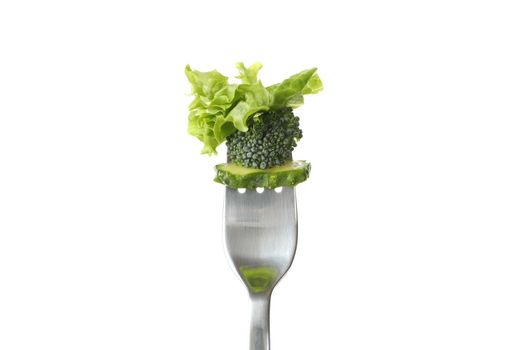 Fork with salad, cucumber and broccoli isolated on white background