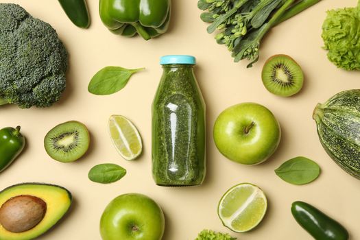 Vegetables, fruits and smoothie on beige background