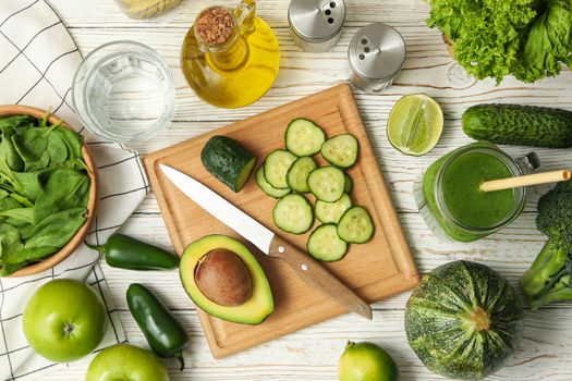 Concept of cooking salad on wooden table