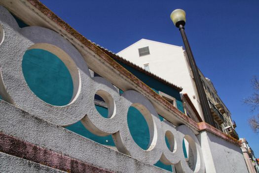 Narrow and colorful streets, majestic facades, windows and balconies of Lisbon, Portugal
