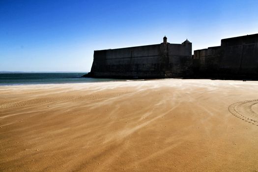 Beautiful beach called Praia da Torre in Lisbon, Portugal, in a sunny day of Spring